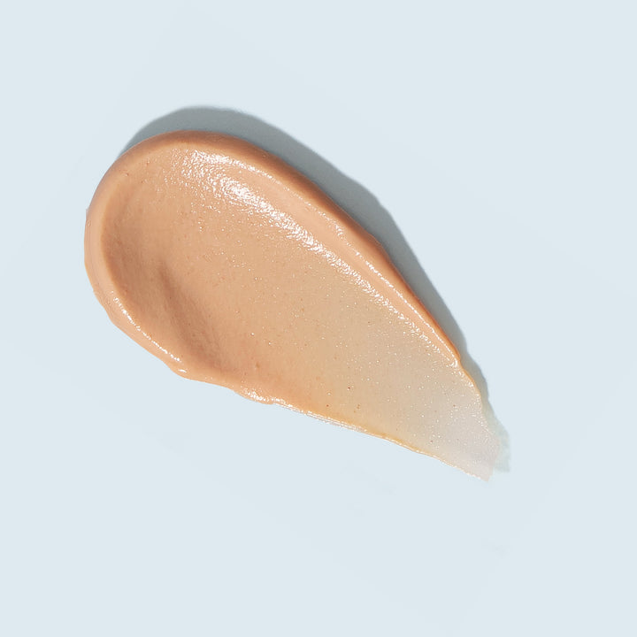 Swatch for TiZO AM Replenish Lightly Tinted on light blue background.