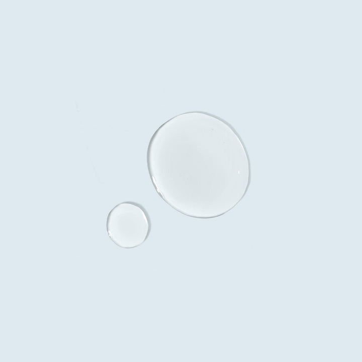 TiZO Gentle Amino Gel Cleanser swatch on light blue background.