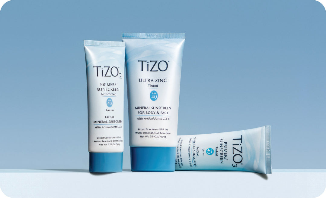 tizo2 primer/sunscreen; tizo ultra zinc tinted; tizo3 primer/sunscreen spf 40 on blue background