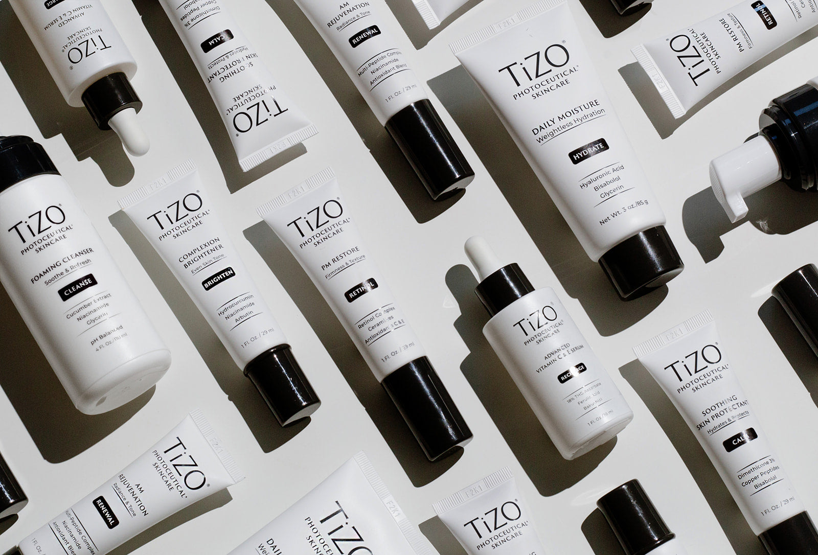 TiZO photoceutical skincare products lay in a pattern
